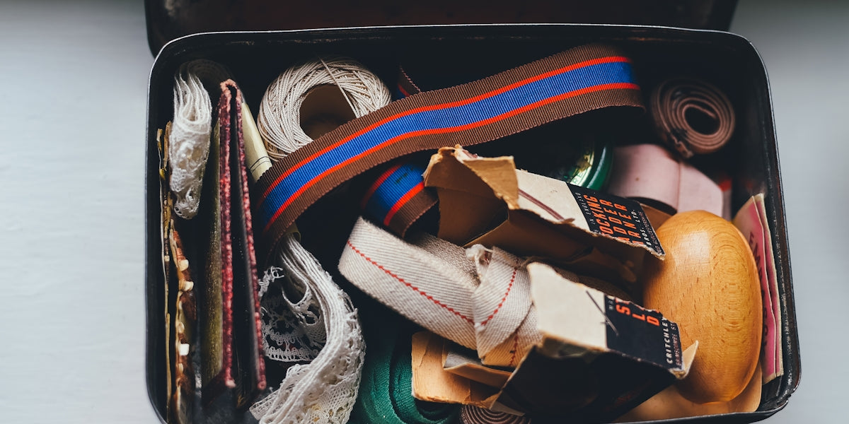 assorted belts and packs on metal case