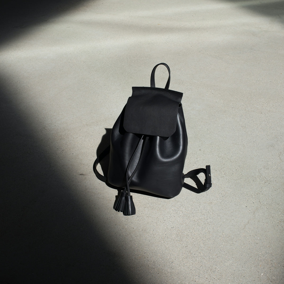black leather bucket bag
