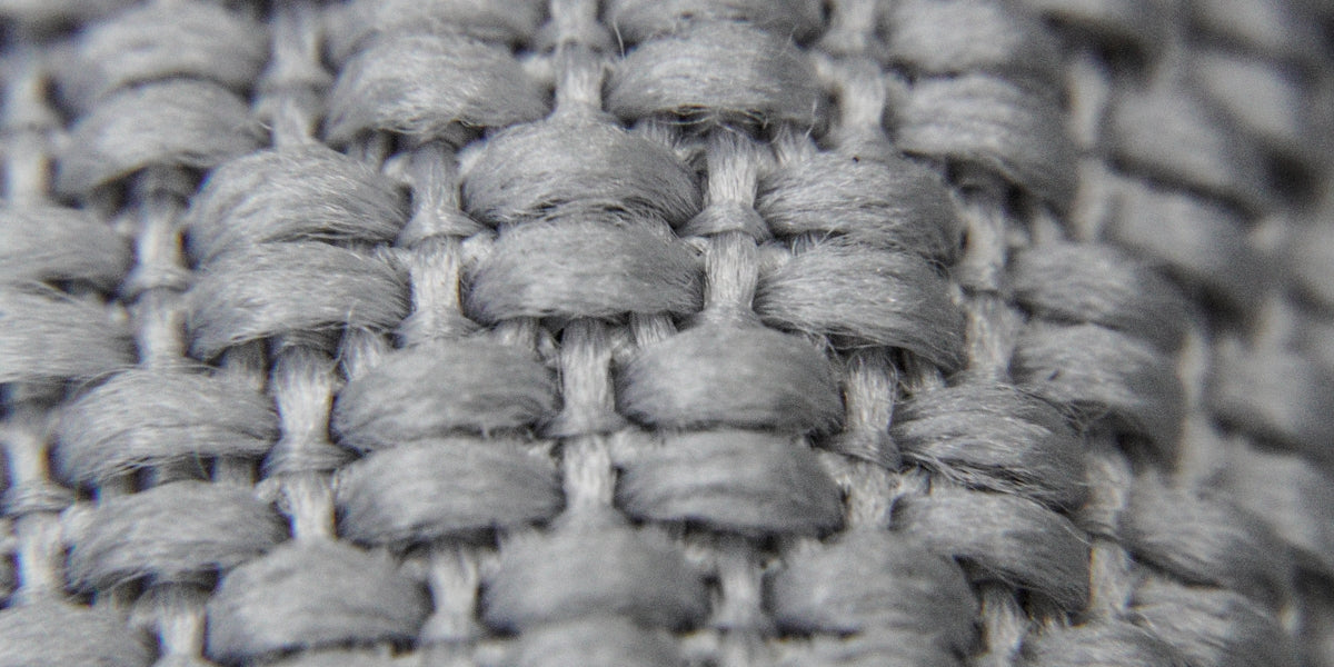 a close up view of a woven material