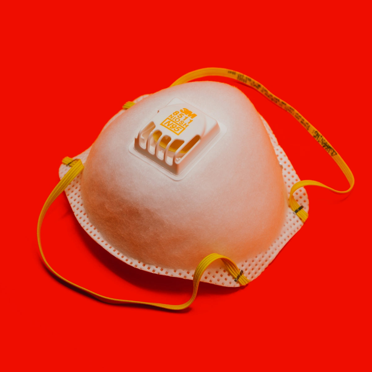 white and yellow leather sling bag