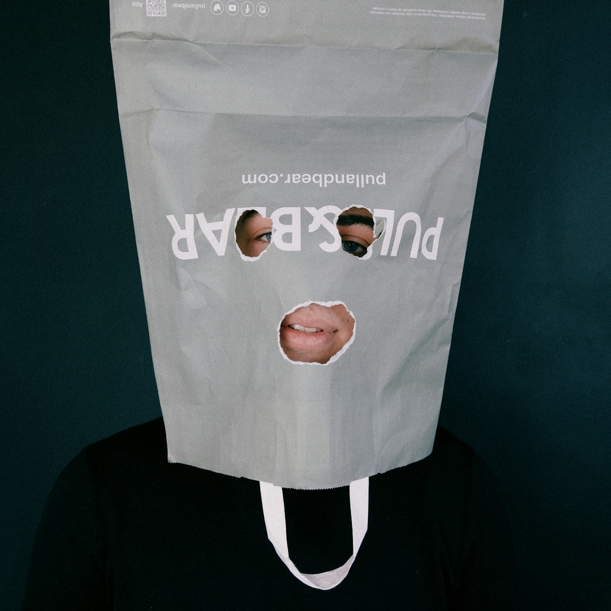 a person with a paper bag on their head
