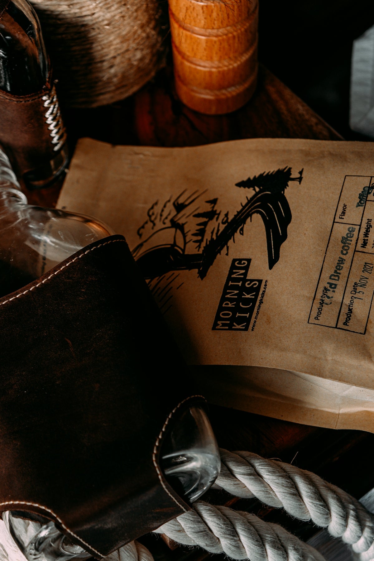 a brown bag sitting on top of a wooden table