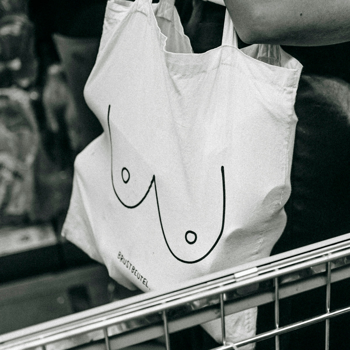 a white bag with a black outline on it