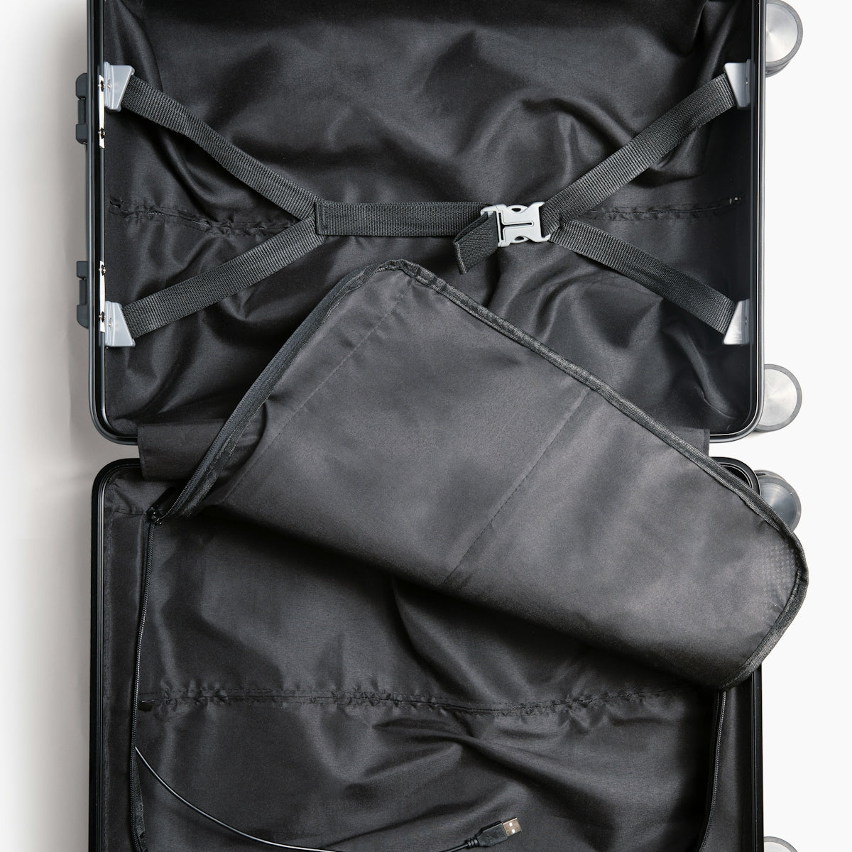 a suit case is open on a white surface