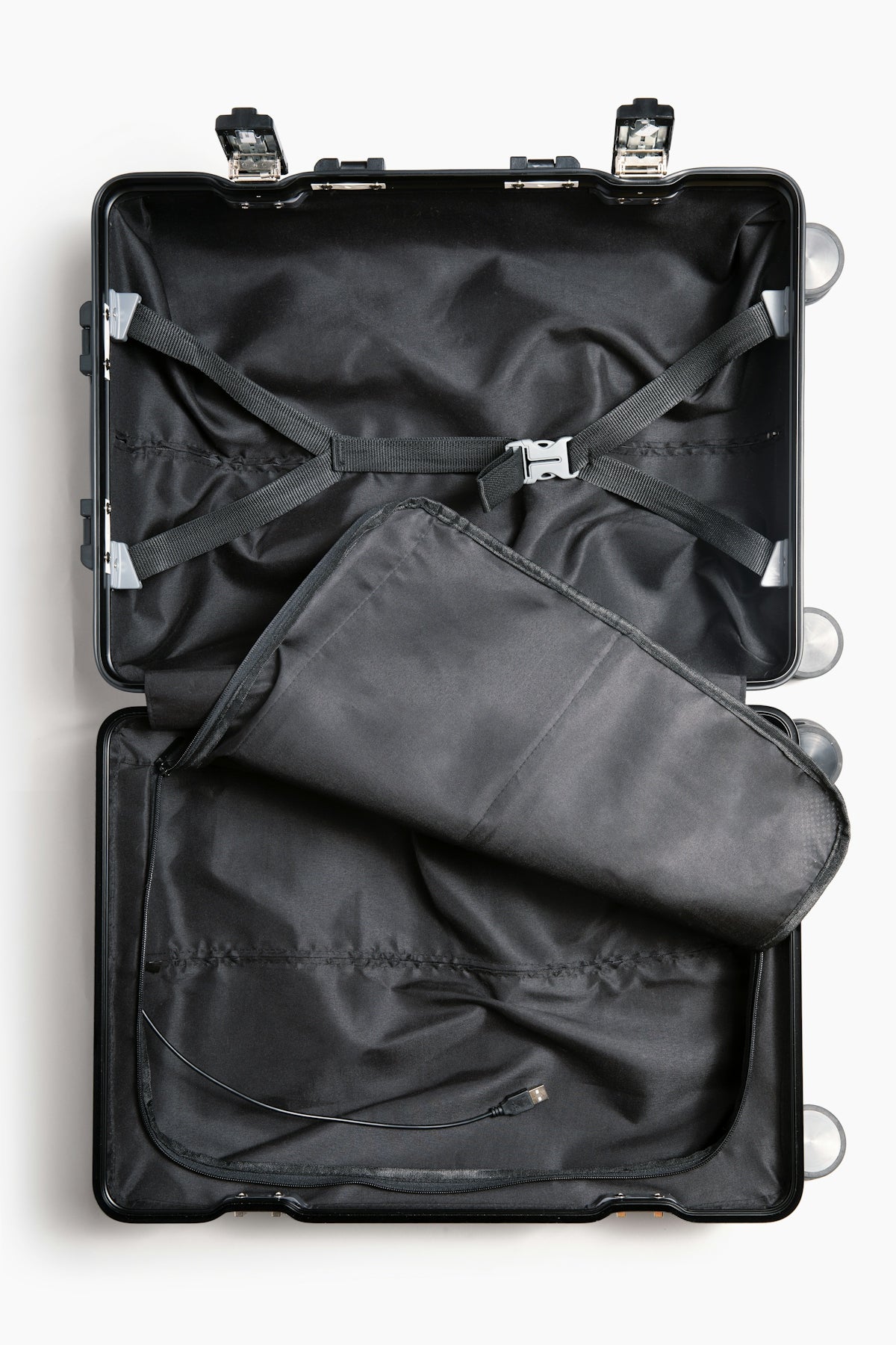 a suit case is open on a white surface