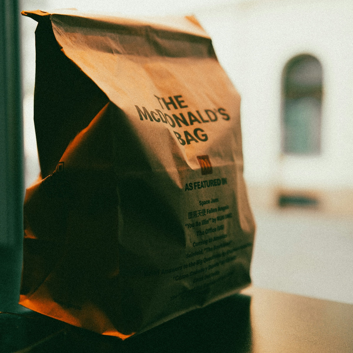 a brown paper bag sitting on top of a table
