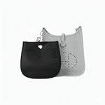 Eco-friendly black inner bag insert displayed with a luxury gray handbag on white background