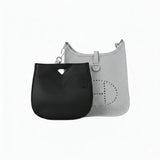 Eco-friendly black inner bag insert displayed with a luxury gray handbag on white background