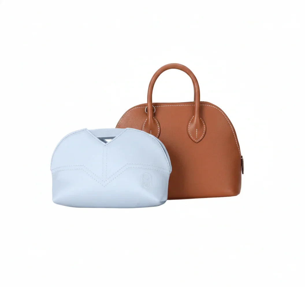 Eco-friendly white inner bag and brown luxury handbag against white background